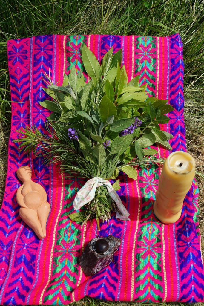 Photo of the scarf and herbs for a closing the bones ceremony