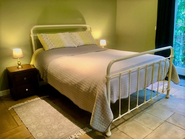 Photo of your bed in the retreat in the garden room