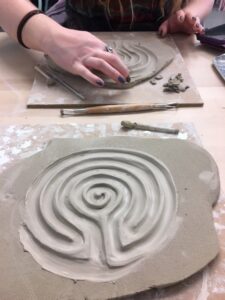 Photo of a clay labyrinth being made